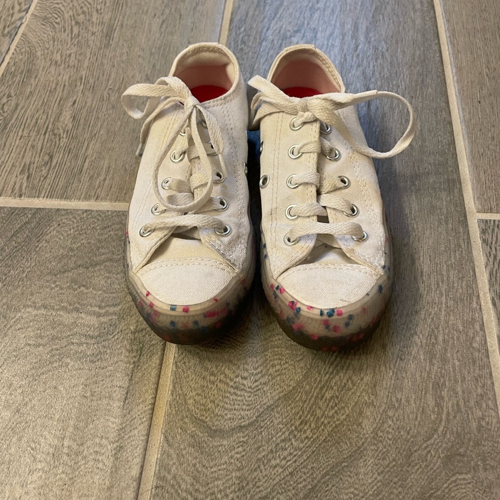 Kids white Converse with clear soul and pink and blue confetti